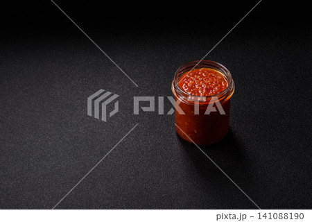 Red tomato Bolognese sauce with spices, salt, pepper, and herbs. A red sauce Red tomato Bolognese sauce with spices, salt, pepper, and herbs. A red sauce 141088190