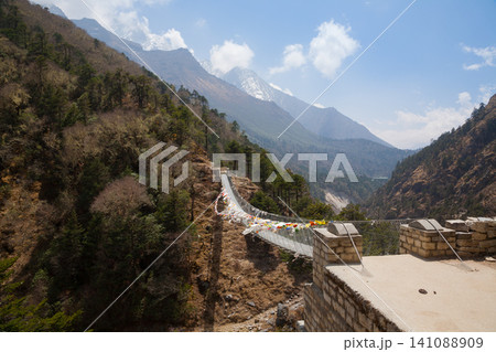 Imja river suspension bridge view along EBC trek, Nepal Imja river suspension bridge view along EBC trek, Nepal 141088909