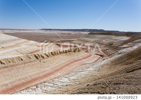 Kyzylkup plateau landscape, Mangystau desert. Rock strata formations Kyzylkup plateau landscape, Mangystau desert. Rock strata formations 141088923