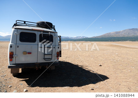 Off-road vehicles in remote region of Mongolia. Altai Tavan Bogd National Park Off-road vehicles in remote region of Mongolia. Altai Tavan Bogd National Park 141088944