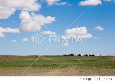 Dirt road in mongolian steppe, Gobi desert landscape, Mongolia Dirt road in mongolian steppe, Gobi desert landscape, Mongolia 141089023