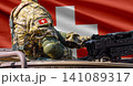 Switzerland flag with soldier at machinegun turret 141089317