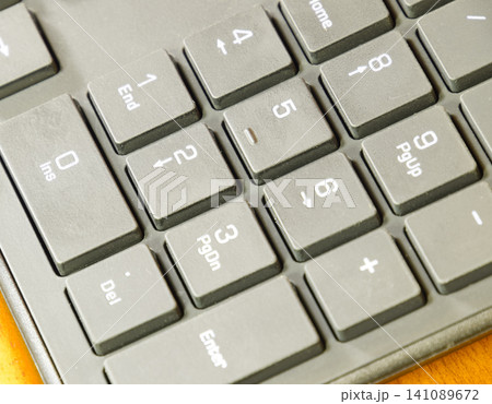 Black slim keyboard computer. A peripheral input device 141089672