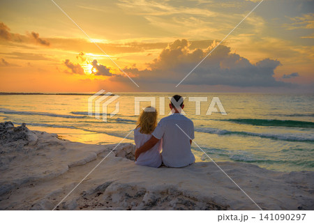 Wedding dress on beach cabana with turquoise ocean view Wedding dress on beach cabana with turquoise ocean view 141090297