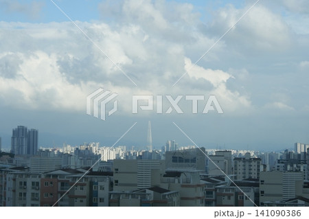 Urban cityscape and residential area view on a bright day Urban cityscape and residential area view on a bright day 141090386