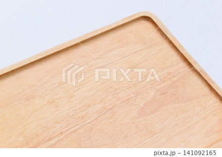 brown wooden tray isolated on white background brown wooden tray isolated on white background 141092165