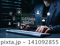 Customer insights analytics and audience behavior research concept. Person using laptop with customer targeting, feedback rating, market data analysis, brand strategy, customer experience management 141092855