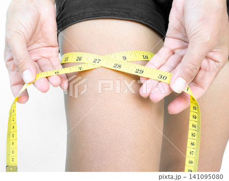 Leg woman with tape measure, thigh slim body non cellulite aesthetic slimming loss weight girl small size, shape lose young portrait model beautiful. 141095080