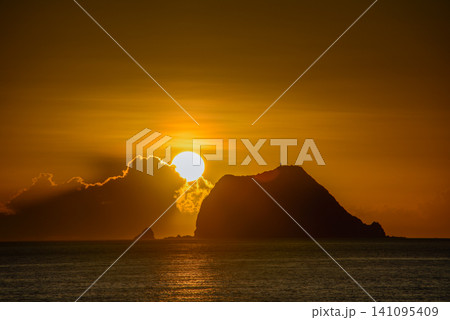 Stunning Sunrise Behind Keelung Islet in Wanli, Taiwan Stunning Sunrise Behind Keelung Islet in Wanli, Taiwan 141095409