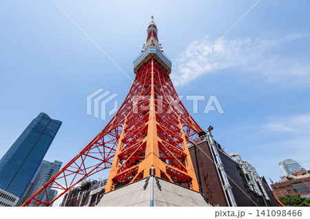 Low-angle view of the Tokyo Tower in Minato, Tokyo, Japan. It is a lattice tower inspired by the Eiffel Tower. In Japan, it is the second-tallest tower after Tokyo Skytree. Low-angle view of the Tokyo Tower in Minato, Tokyo, Japan. It is a lattice tower inspired by the Eiffel Tower. In Japan, it is the second-tallest tower after Tokyo Skytree. 141098466