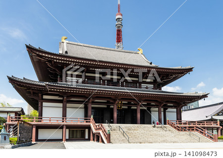 Building view of the Zojo-ji Hondo (main hall) with the Tokyo Tower in Minato, Tokyo, Japan, which is a Jodo-shu Buddhist temple. Building view of the Zojo-ji Hondo (main hall) with the Tokyo Tower in Minato, Tokyo, Japan, which is a Jodo-shu Buddhist temple. 141098473