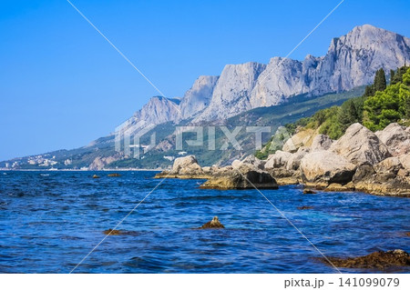 Views for the Crimean mountains and beach in sunny summer day 141099079