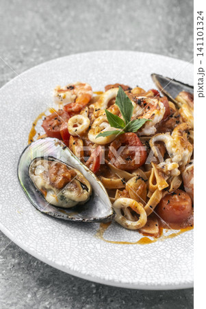 tagliatelle frutti di mare mixed fresh seafood pasta on restaurant table tagliatelle frutti di mare mixed fresh seafood pasta on restaurant table 141101324