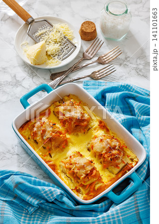 Cheesy Veggie Baked White Fish in blue baking dish 141101663