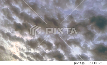 Golden light breaking through dramatic morning clouds 141101756