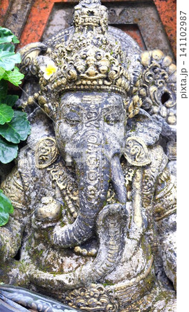 Ganesha statue (or Ganesh sculpture) in a traditional Balinese garden style. Ganesha statue (or Ganesh sculpture) in a traditional Balinese garden style. 141102987