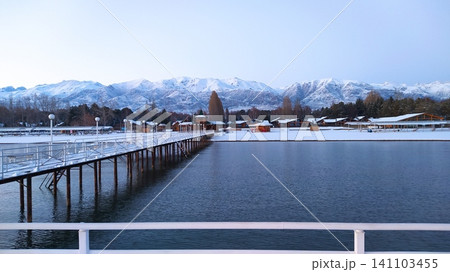 Pier on Issyk-Kul lake, mountains and winter nature - Kyrgyzstan Pier on Issyk-Kul lake, mountains and winter nature - Kyrgyzstan 141103455