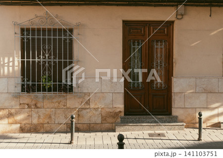 Old European House Bathed in Warm Evening Sunlight 141103751