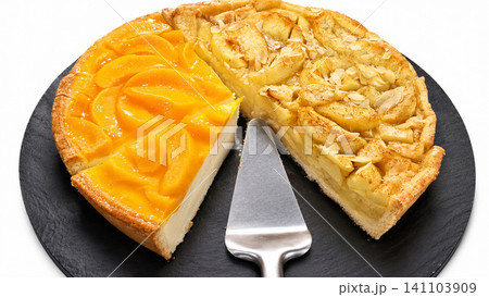 Peach Cheesecake and Apple Almond Tart on White Background Peach Cheesecake and Apple Almond Tart on White Background 141103909