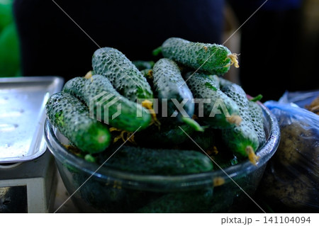 cucumbers in a bowl. cucumbers in a white bowl on the background of nature 141104094