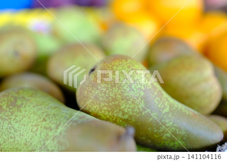 Fresh winter pears displayed at local market seasonal fruit with natural sweet taste Fresh winter pears displayed at local market seasonal fruit with natural sweet taste 141104116