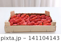 strawberries in a wooden box ripe juicy strawberries, harvest in a basket on the table 141104143