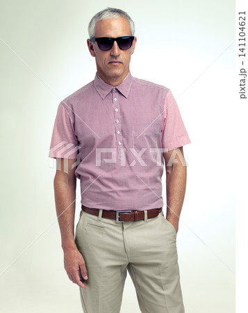 Confident, businessman or serious in fashion, business or stylish as outfit, apparel or eyewear. Mature man, hand in pocket or sunglasses as smart, casual or clothing in studio on white background Confident, businessman or serious in fashion, business or stylish as outfit, apparel or eyewear. Mature man, hand in pocket or sunglasses as smart, casual or clothing in studio on white background 141104621