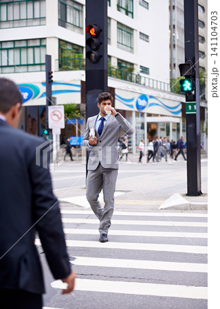 Businessman, city and coffee with commute, travel and thinking for career or job. Man, crosswalk and cape town with cityscape, startup or professional work with morning routine in urban environment 141104703