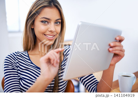 Businesswoman, tablet and portrait in workplace for online browsing, website or internet for creative project. Lens flare, technology and face of happy person for search, planning or connection 141104919