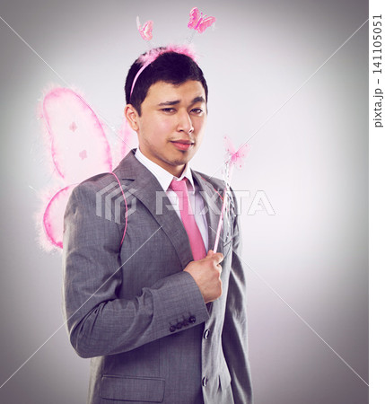 Corporate, man in fairy costume and portrait with magic in business for career growth on grey background. Butterfly, wand and wings, fantasy cosplay for dress up or wish for professional progress 141105051