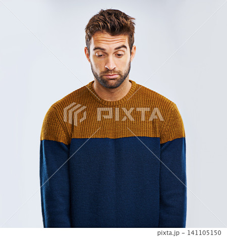 Frustrated man, bored and down with stress, depression or anxiety on a studio background. Young, tired or upset male person or model with mood, disappointed or mental health breakdown on mockup space 141105150