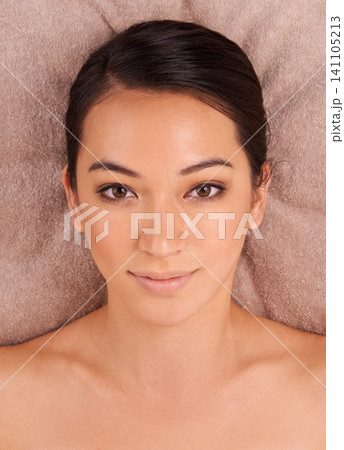 Woman, relax and portrait in spa for massage, wellness and skincare for body, treatment and detox for luxury. Happy or young person and smile for rest on table for break, care and beauty for holiday Woman, relax and portrait in spa for massage, wellness and skincare for body, treatment and detox for luxury. Happy or young person and smile for rest on table for break, care and beauty for holiday 141105213