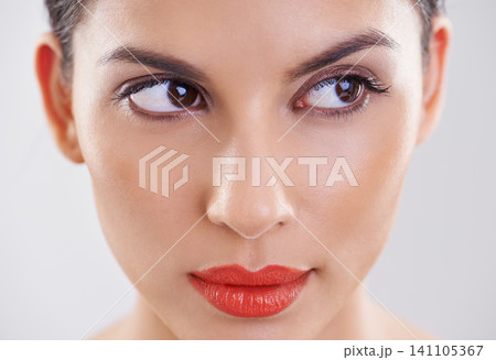 Woman, beauty and thinking in studio of makeup, dermatology and skin care on a white background. Closeup and face of a young model or person with facial foundation and inspiration or cosmetics ideas 141105367