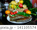 full recipe Complete process of cooking crispy fried crucian carp from cleaning and seasoning to golden frying in nonstick pan creating traditional homemade fish recipe close up food video 141105574