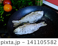 full recipe Complete process of cooking crispy fried crucian carp from cleaning and seasoning to golden frying in nonstick pan creating traditional homemade fish recipe close up food video 141105582