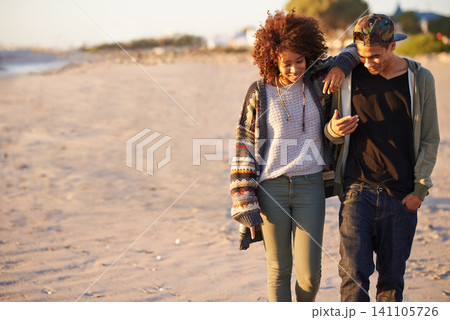 Couple, walking and conversation together on beach, sunset with gen z people on nature date in summer. Love, affection and bonding for romantic relationship, happy partners on relaxing vacation Couple, walking and conversation together on beach, sunset with gen z people on nature date in summer. Love, affection and bonding for romantic relationship, happy partners on relaxing vacation 141105726
