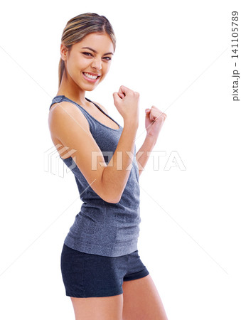 Studio, excited and portrait of athlete, smile and ready to workout for fitness, health and wellness. Woman, adult and female person with care for body with sports, fist and win for girl to celebrate Studio, excited and portrait of athlete, smile and ready to workout for fitness, health and wellness. Woman, adult and female person with care for body with sports, fist and win for girl to celebrate 141105789