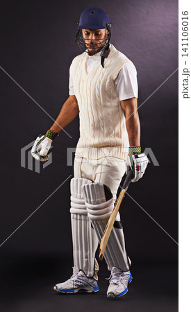 Man, cricket and athlete for sports exercise in studio for professional match, competition or black background. Male person, gear and helmet with mockup space or fitness training, performance or game Man, cricket and athlete for sports exercise in studio for professional match, competition or black background. Male person, gear and helmet with mockup space or fitness training, performance or game 141106016