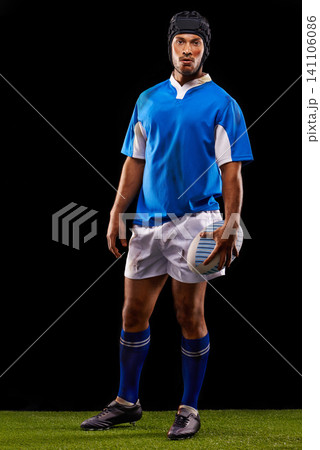 Ball, man and portrait for rugby, sport and active for game, fitness and sportswear on grass or field. Young person, athlete or player and confident with kit for fit, competitive and recreation Ball, man and portrait for rugby, sport and active for game, fitness and sportswear on grass or field. Young person, athlete or player and confident with kit for fit, competitive and recreation 141106086