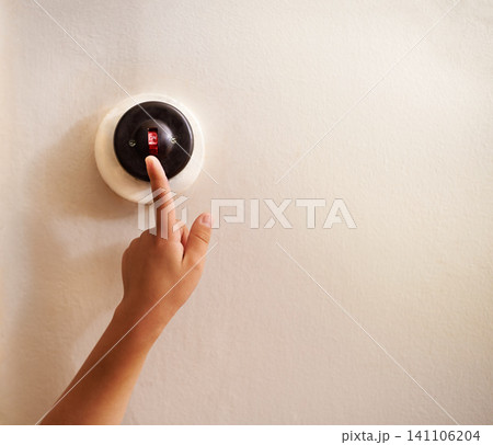 Hand, child and switch on wall for light, electricity and power in house, home and living room with mockup space. Touch, lever and finger of kid by electrical button for lighting, lamp and glow Hand, child and switch on wall for light, electricity and power in house, home and living room with mockup space. Touch, lever and finger of kid by electrical button for lighting, lamp and glow 141106204