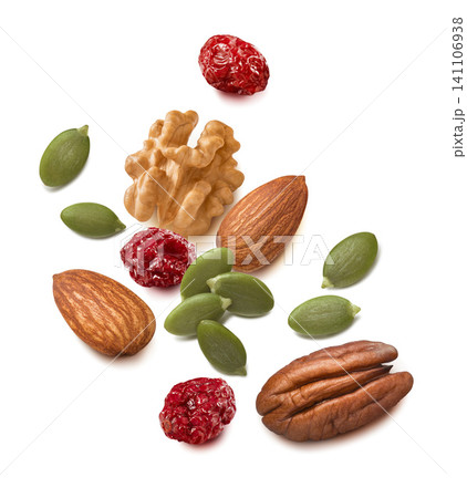 Walnut, pecan and almond nuts, pumpkin seeds, cranberry isolated on white background 141106938