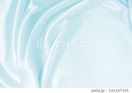 Smooth elegant blue silk or satin luxury cloth texture as abstract background. Luxurious background design Smooth elegant blue silk or satin luxury cloth texture as abstract background. Luxurious background design 141107195