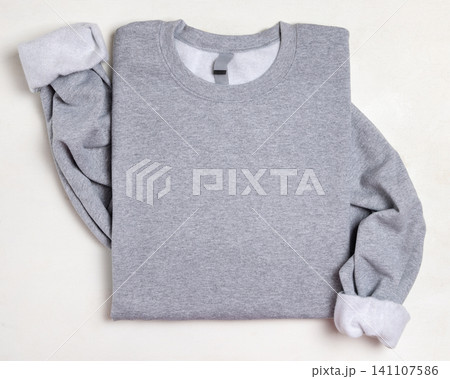 Blank heather grey unisex sweatshirt mockup, folded apparel template, copy space on front 141107586