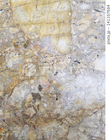 Surface texture of natural beige-brown breccia marble wall. 141107684