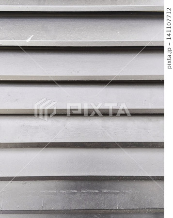 Horizontal shiplap wood wall texture in charcoal gray. 141107712