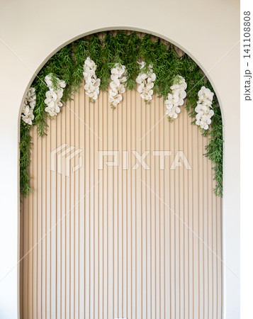 Elegant Floral Arch Background with White Orchids and Green Foliage. Elegant Floral Arch Background with White Orchids and Green Foliage. 141108808