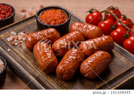 Chicken or pork grilling sausages with garlic, salt, and spices. Grilling sausages 141109345