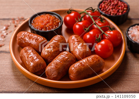 Chicken or pork grilling sausages with garlic, salt, and spices. Grilling sausages 141109350