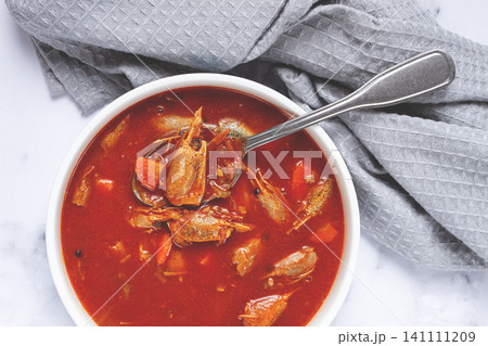 French shrimp bisque soup, on a marble table, close-up, no people, 141111209
