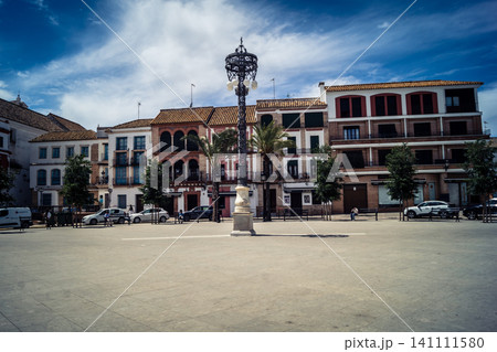 Traditional white-washed narrow streets and historical Andalusian architecture in Carmona Traditional white-washed narrow streets and historical Andalusian architecture in Carmona 141111580